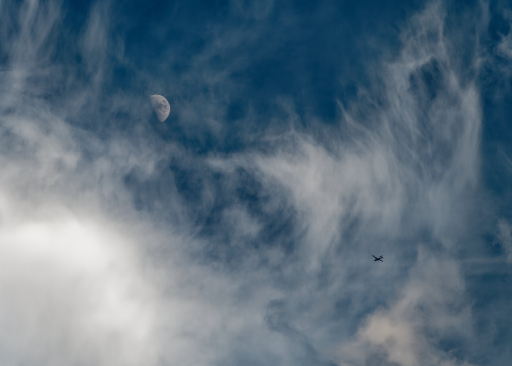 20211211 163052 Sebastian Skydive Clouds Moon Plane Otter DaveSchwartz